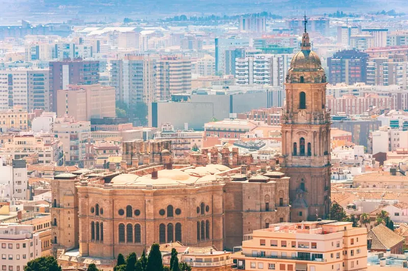 Arial view of Cathedral of Malaga surrounded by brown buildings