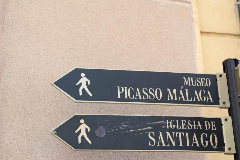 Street sign that shows the direction to the Picasso museum in Malaga. 10 Best Things to Do in 1 Day in Malaga