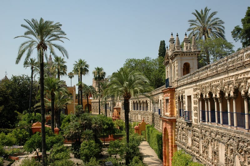 exterior of the Real Alcazar Gardens with trees