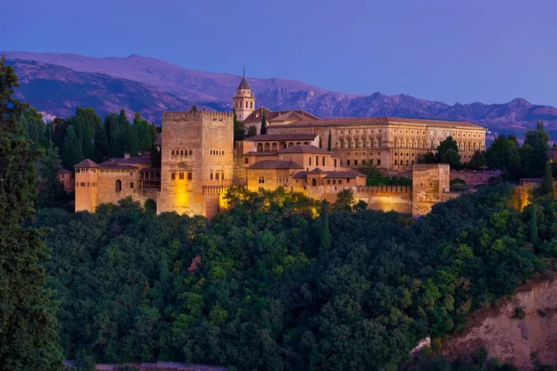 landscape view of the Alhambra Palace surrounded by forest, southern spain in winter