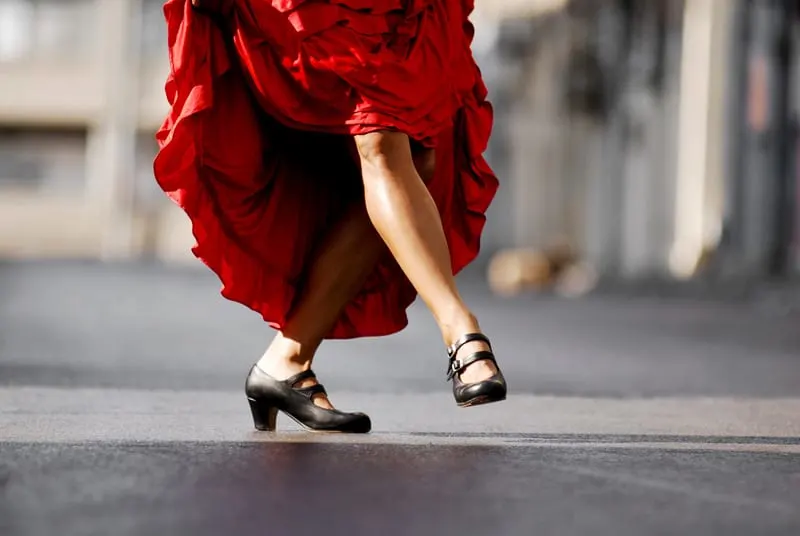 Things to do in Granada, Flamenco, a bottom half view of a flamenco dancer