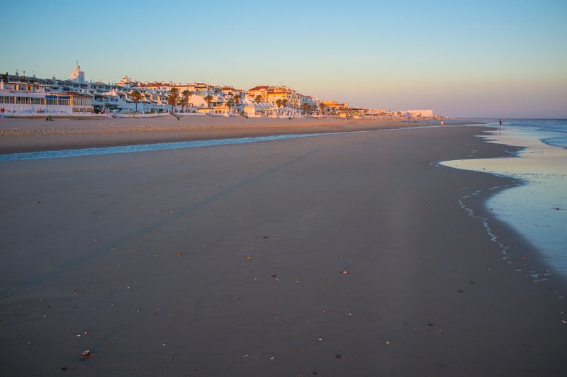 Matalascanas town from beach at Sunset. Costa de la Luz seashore, Huelva, Spain