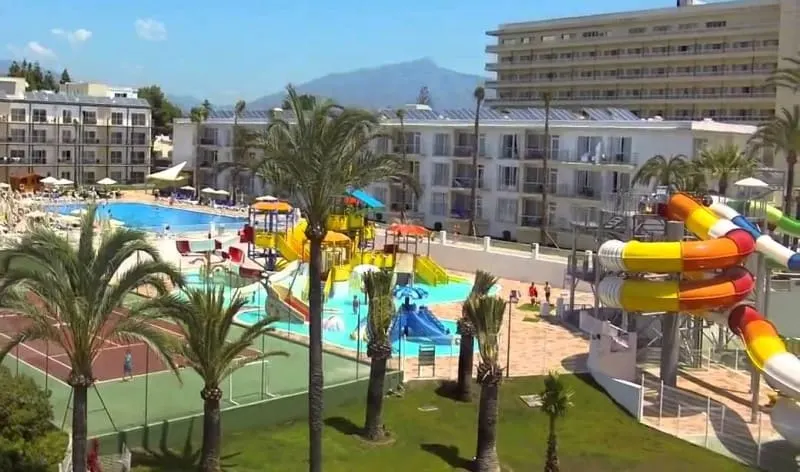 pool area with water sliders at one of the best resorts in malaga