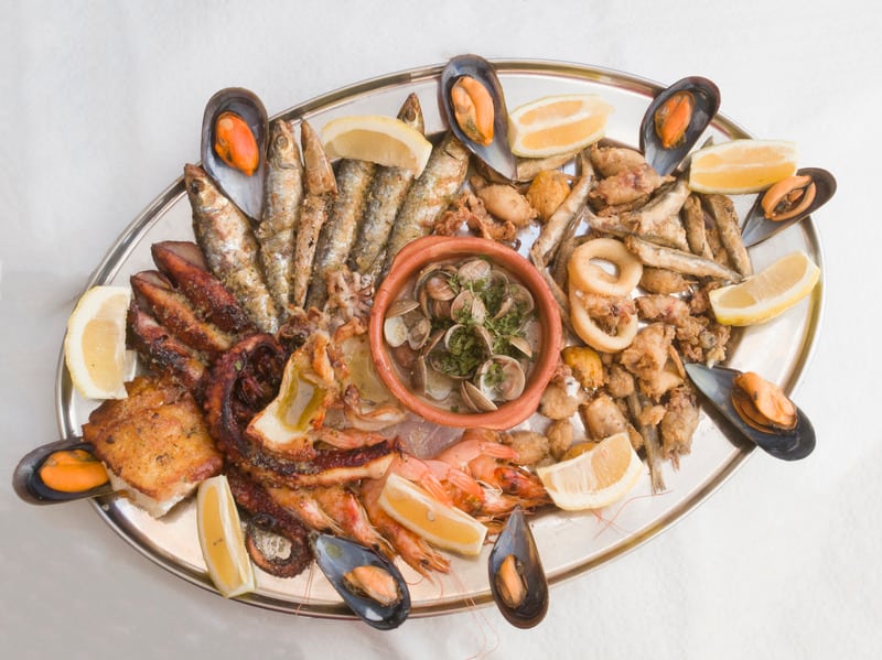 Canva Seafood platter. Fritura de pescado. - What to Eat in Malaga: Local’s Guide to the Best Food in Malaga, Spain