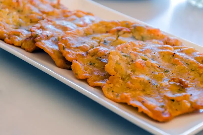 Detail of tapa of shrimp omelettes, tortillitas de camarones. Typical shrimp fritters in Cadiz, Andalusia, Spain