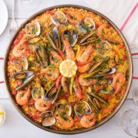 Seafood paella on a kitchen table