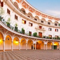 Panorama of picturesque square plaza del Cabildo in the morning, Seville, Andalusia, Spain