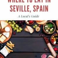 where to eat in Seville, Spain - food ingredients bordering a wooden black table