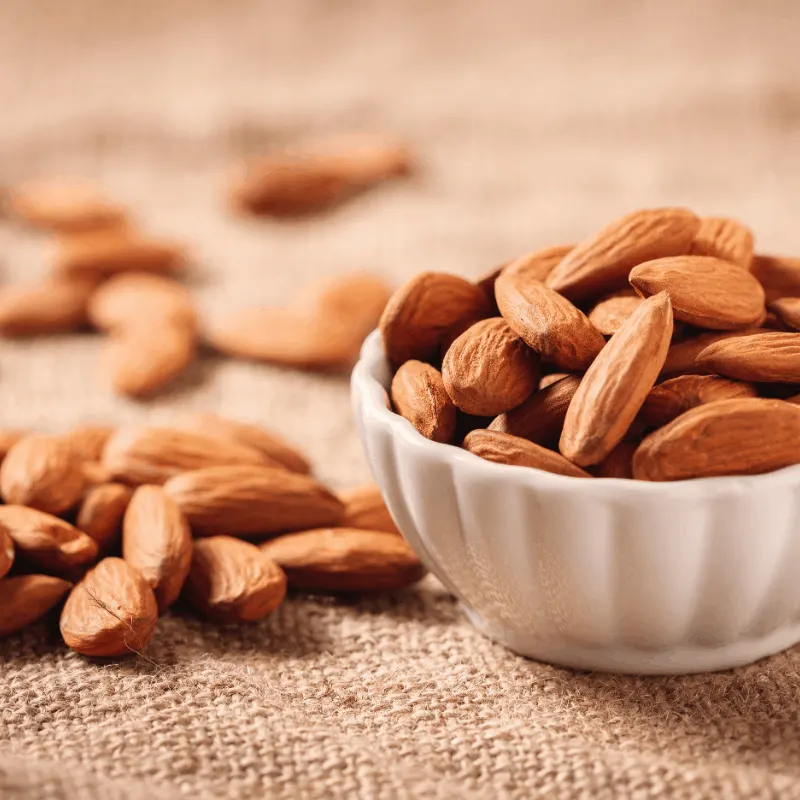 natural almonds in a cup for the turron blando
