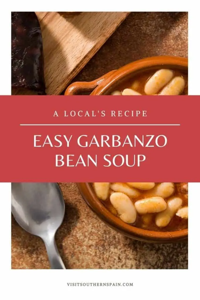 Are you looking for an easy Spanish bean soup recipe? This tasty garbanzo soup recipe comes straight from Spain and comes with vegan, vegetarian and meat variations. When searching for Spanish beans recipes, this one is a must. Garbanzo beans are a staple in Southern Spain and this garbanzo bean soup brings a part of Spain to your home. It's also a great winter dish and one of the best Spanish soups. A must for vegetarian food from Spain too! #beansoup #spanishbeansoup #garbanzos #garbanzobeans