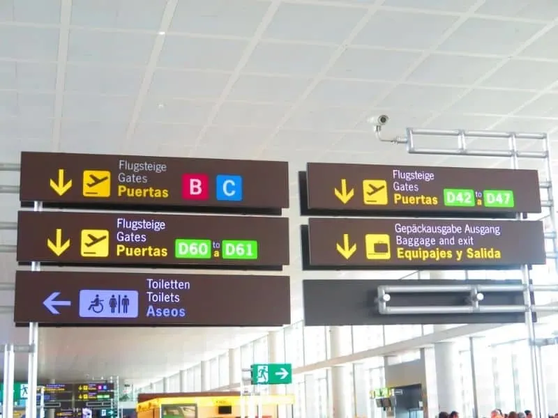 a picture of a signage in malaga airport spain