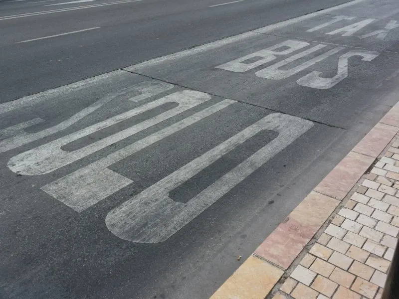 taxi malaga road lane with writings on the lane