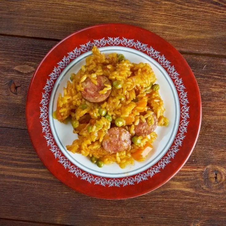 Spanish Chorizo Rice in a bowl on a wooden table