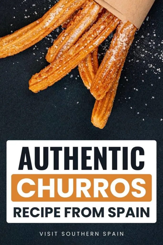 Some churros are on top on a black surface.