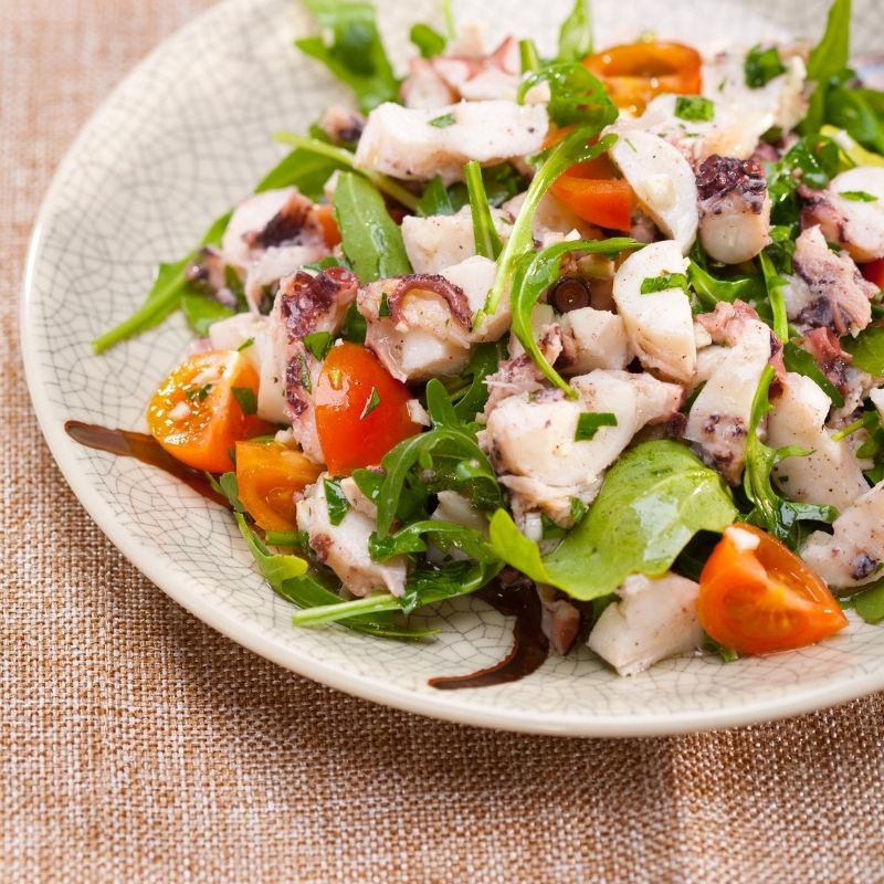 spanish octopus salad recipe in a plate