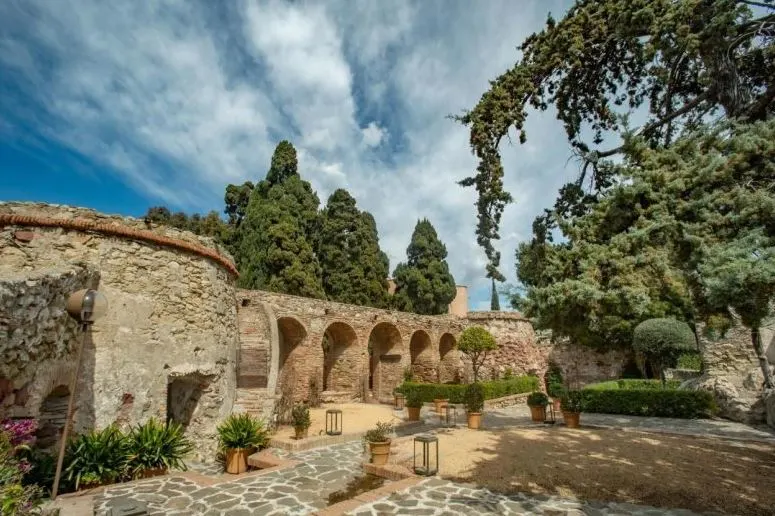 exterior view of a garden on Soho Boutique Castillo de Santa Catalina