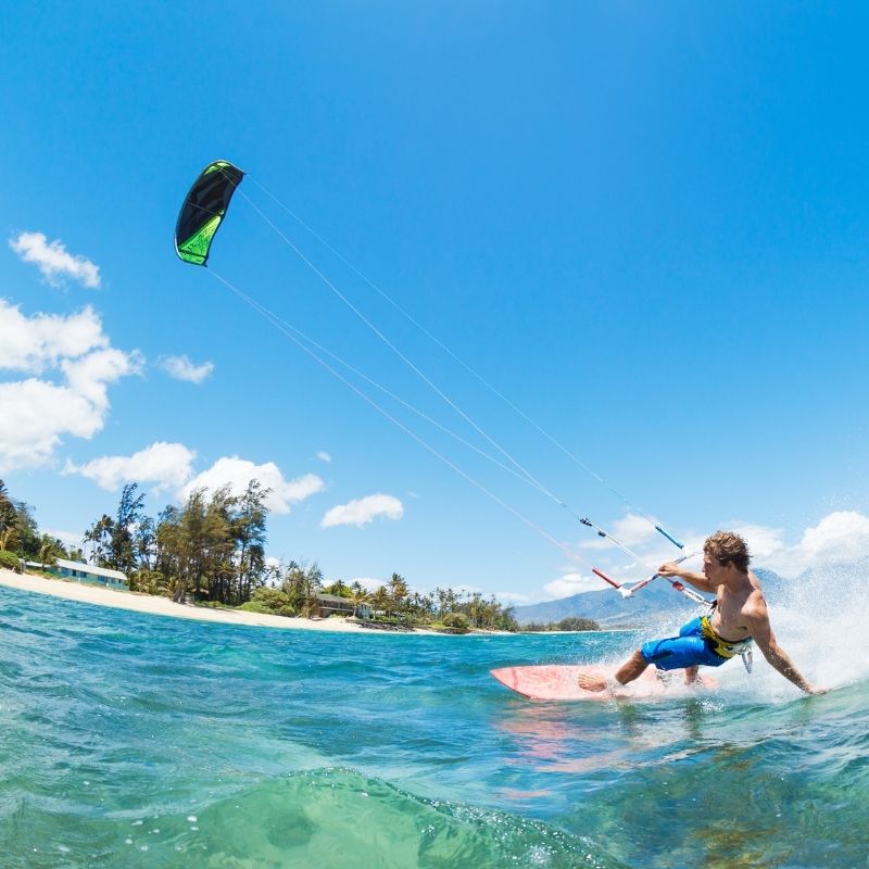 man windsurfing in Andalucia in July, Surfing And Kitesurfing In Tarifa