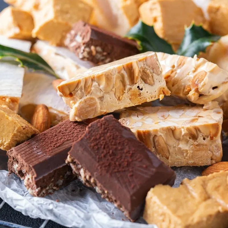 different types of Spanish Turron  on a festive plate