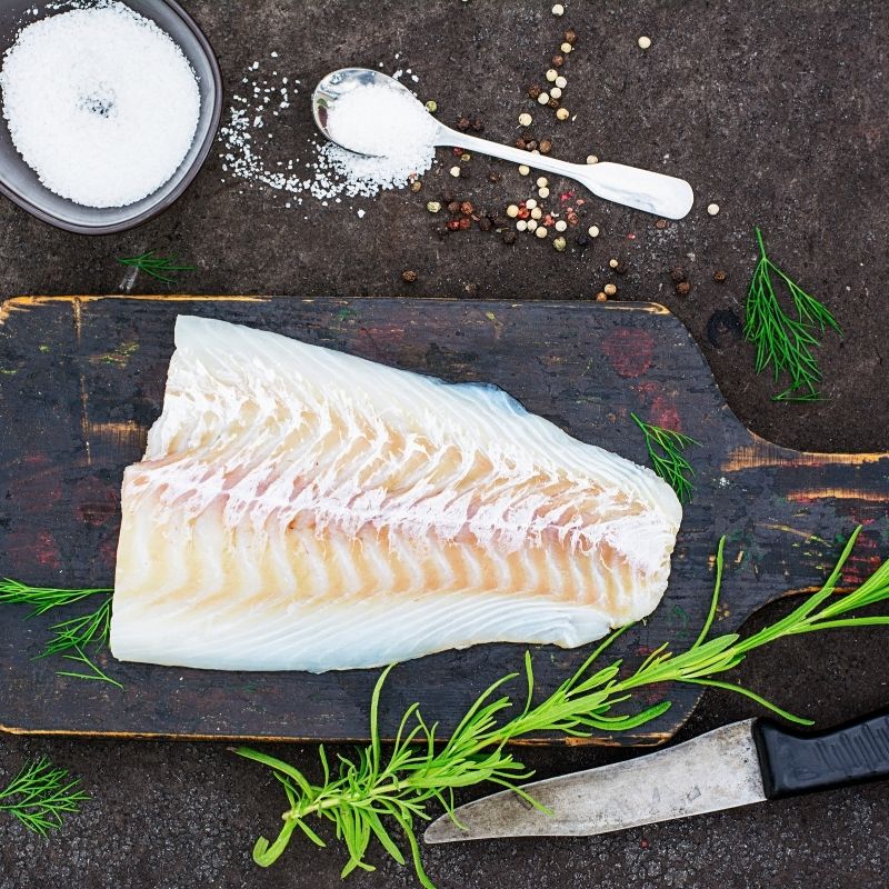 cod fillet on a black board for the mackerel fillet recipe.