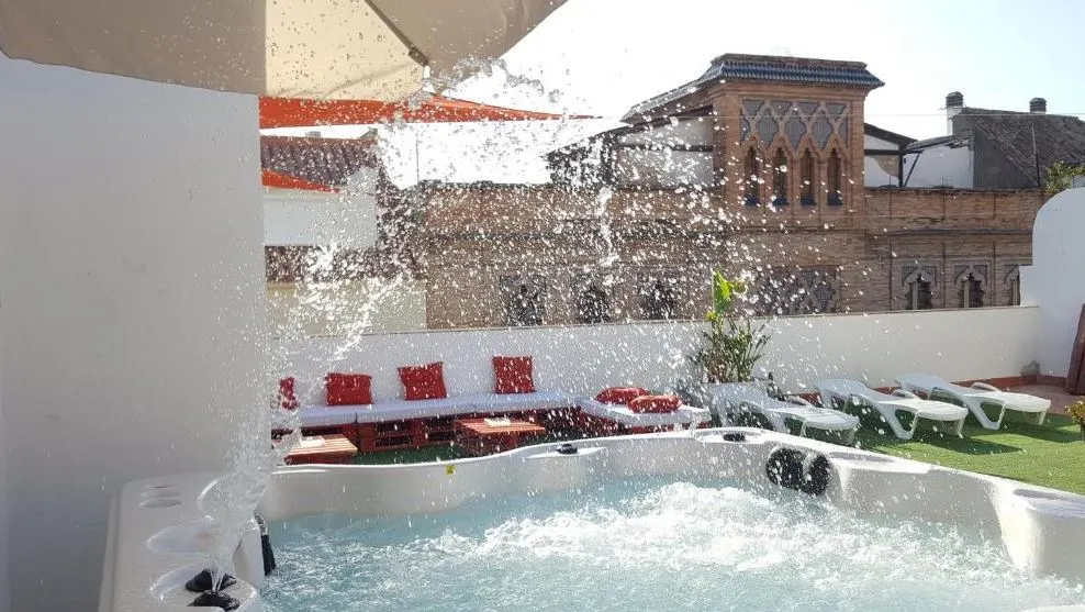 a jacuzzi on top of Hotel Boutique Doña Lola