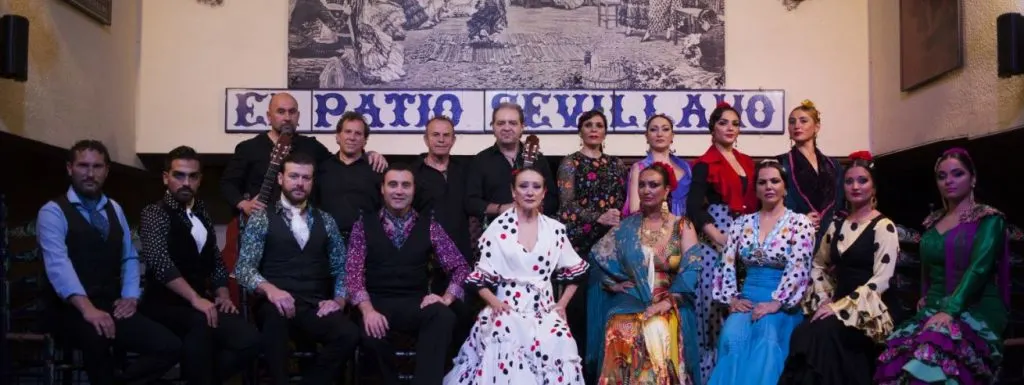 El Patio Sevillano, flamenco team sitting and standing for a picture