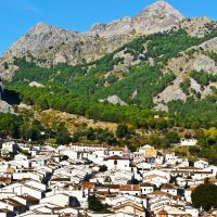 Grazalema, a white town overlooked by a rugged mountain, Andalucia in August