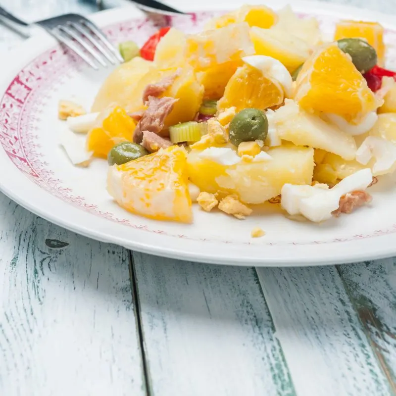 traditional spanish salad with oranges, fish and other vegetables. 