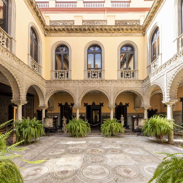 interior court of Museo Palacio de la Condesa de Lebrija with columns and plants