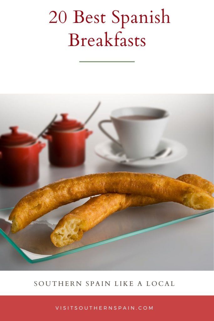 A plate with 2 spanish churros, next to a cup of coffee, on a white surface. On top it's written 20 best spanish breakfasts.