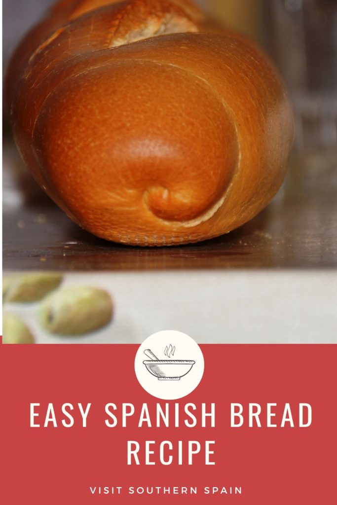 Are you looking for an easy Spanish bread recipe? This rustic white bread called Pitufo is one of the best bread recipes from Spain. The Pitufo is a typical Spanish bread that is usually eaten for breakfast in Malaga. The most iconic breakfast in Spain is El Seranito - a delicious steak sandwich with Pitufo bread. This soft Spanish bread recipe is easy to make and the best part, you get mini Pitufos that your kids will absolutely love. #spanishbreadrecipe #spanishbread #pitufo #pituforecipe