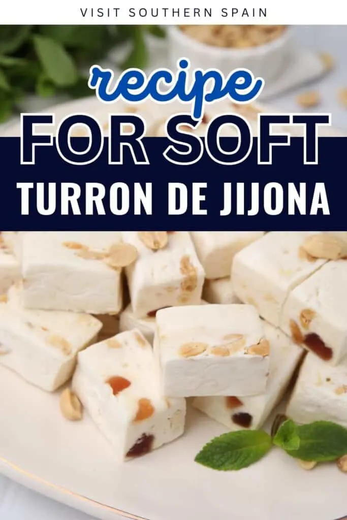 A close up photo of a stack of Turron that have garnish on the side.