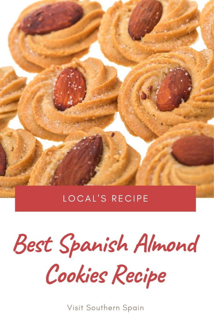 Closeup with almond cookies. Under the photo it's written Best Spanish almond cookies Recipe. 