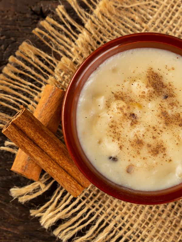 Spanish almond soup decorated with cinnamon in a clay bowl.