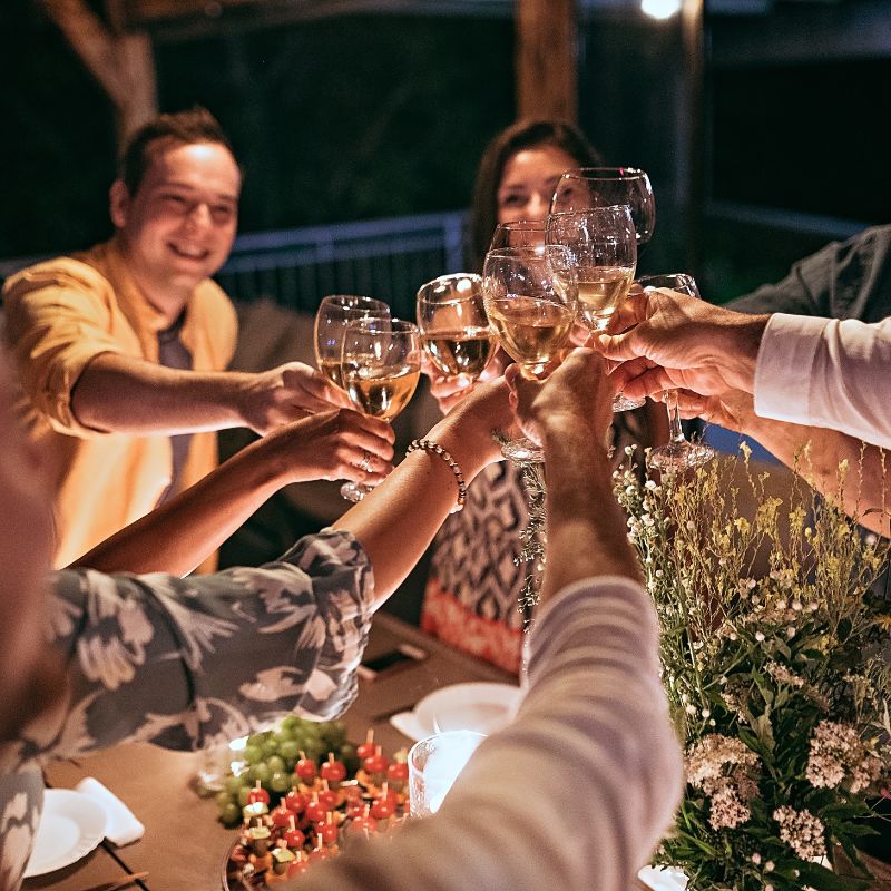 friends having a toast at a spanish themed party: 25 Ideas for the Best Spanish Themed Party 