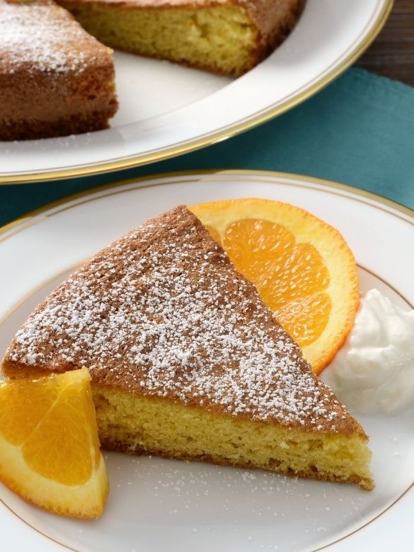 olive oil lemon cake on a white plate. 25 Ideas for the Best Spanish Themed Party 