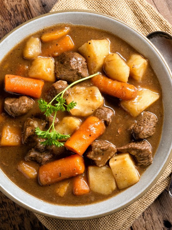 spanish beef stew with potatoes in a bowl