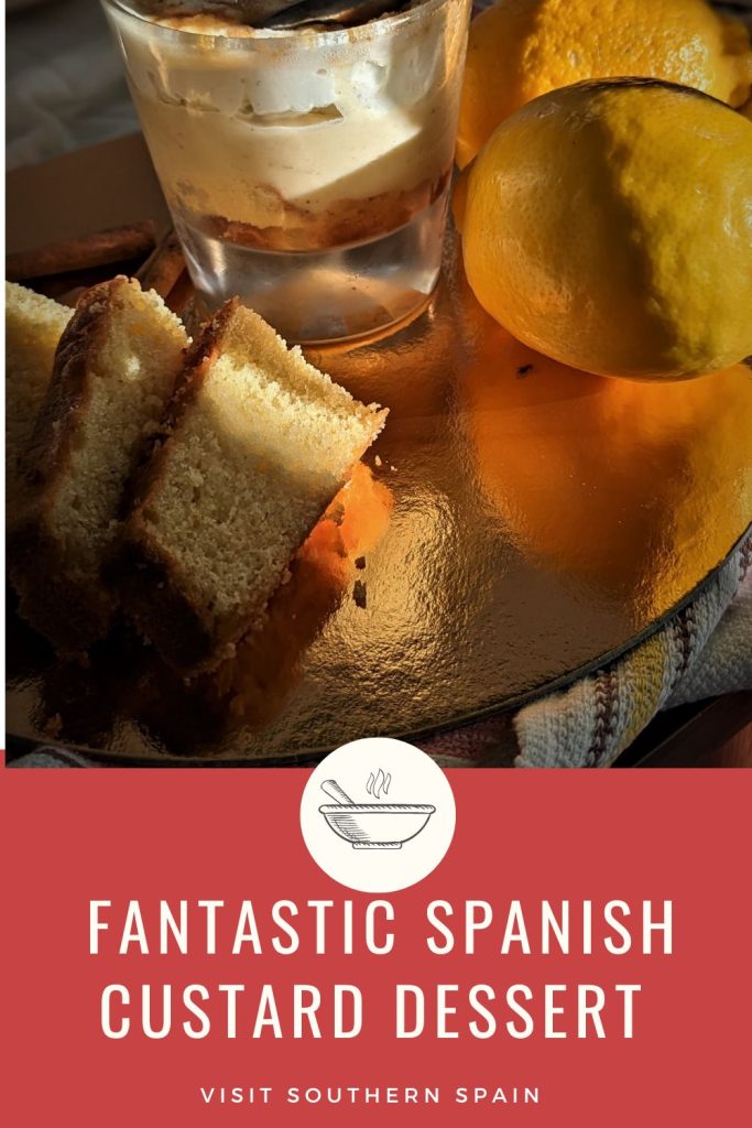 A glass of Goxua dessert on a golden plate, with lemons and sponge cake next to it. Under it it's written Fantastic Spanish custard dessert.