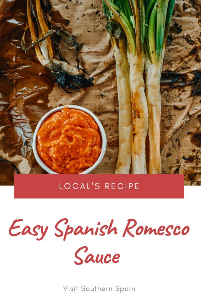 Romesco sauce and vegetables on a table. Under it's written Easy Spanish romesco sauce.