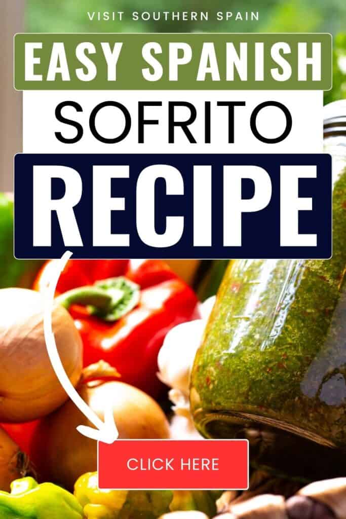 A jar of sofrito can be seen along with some onions, red bell pepper and green chillis.