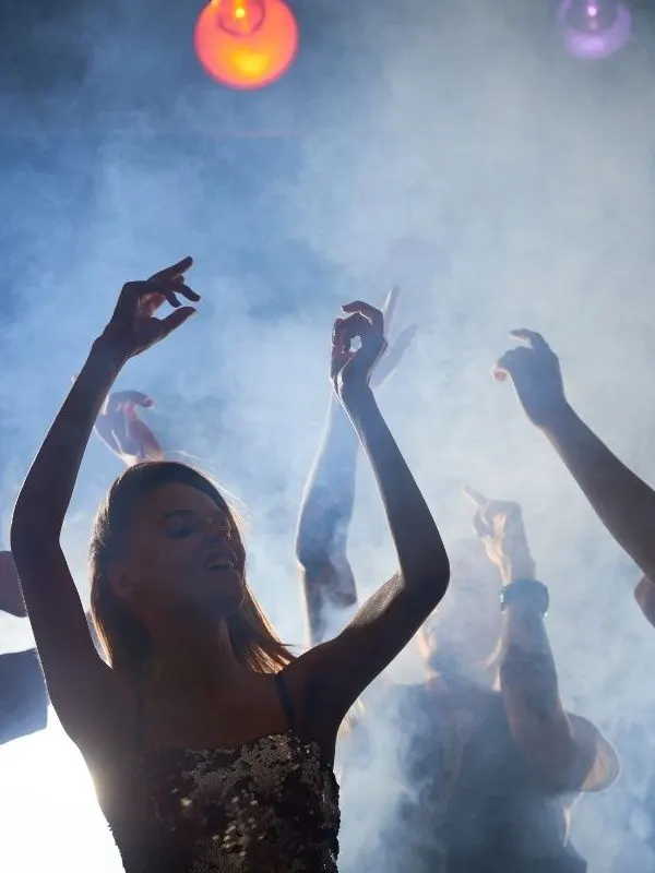 people dancing at a nightclub in Marbella