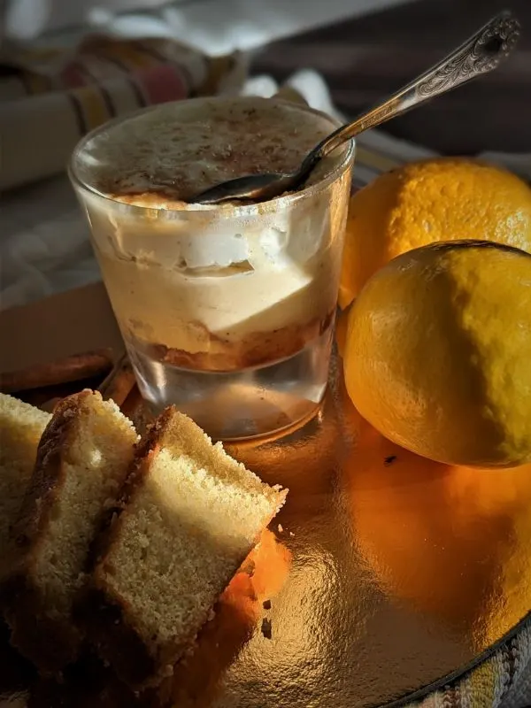 Goxua, a Spanish custard dessert in 2 glasses on a kitchen table cloth (1)