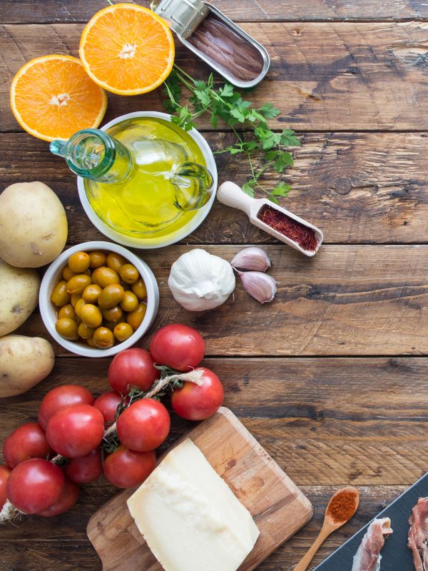 Spanish ingredients on a wooden table. 20 Best Spanish Ingredients You Should Know