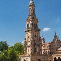 Tower at Plaza de Espana in park of Maria Luisa in Seville Spain.