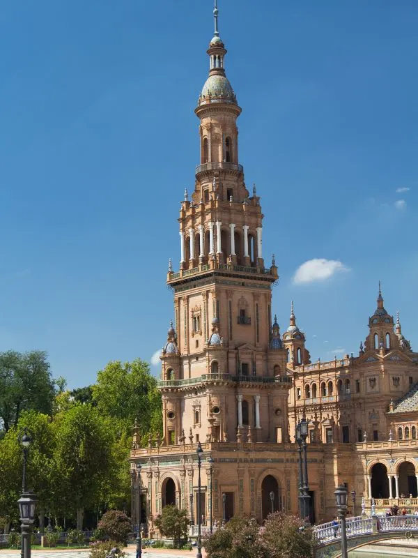 Tower at Plaza de Espana in park of Maria Luisa in Seville Spain.