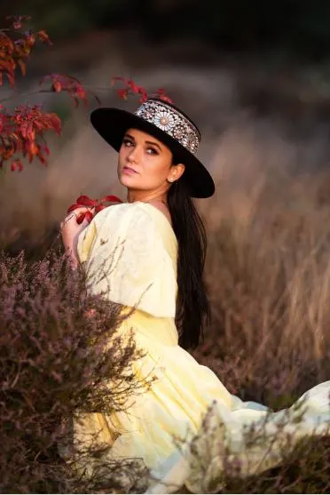 a girl wearing a Sombrero Cordobese. 20 Best Spanish Souvenirs from Andalucia