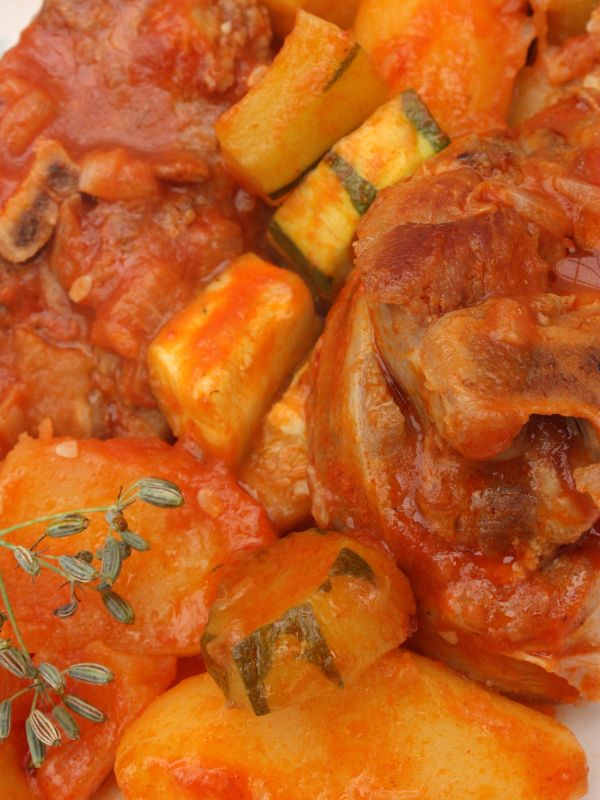 closeup with Spanish osso buco recipe with potatoes