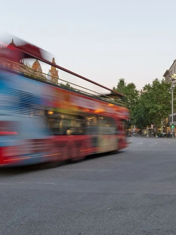 taking a hop-on-hop-off-bus to explore the city of Malaga