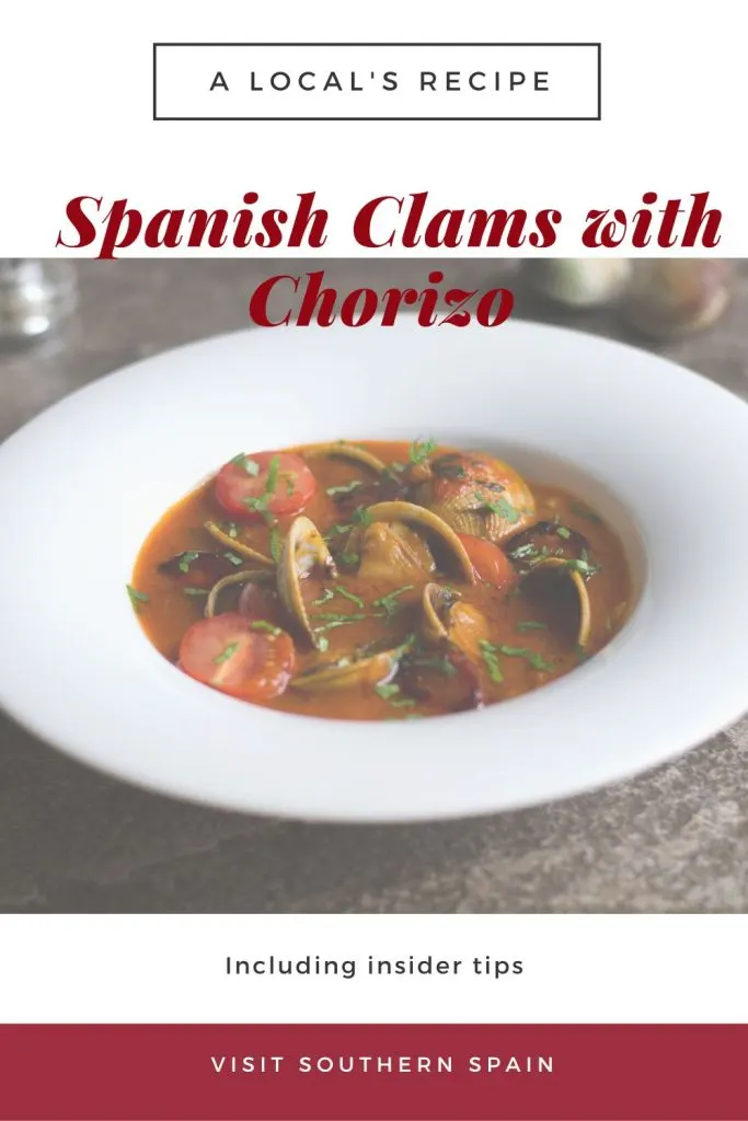 clams with chorizo in a bowl. On top it's written Spanish Clams with chorizo.