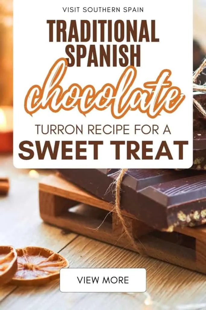 A pile of chocolate turron that has been tied with a string. Dried slices of orange are on the side.
