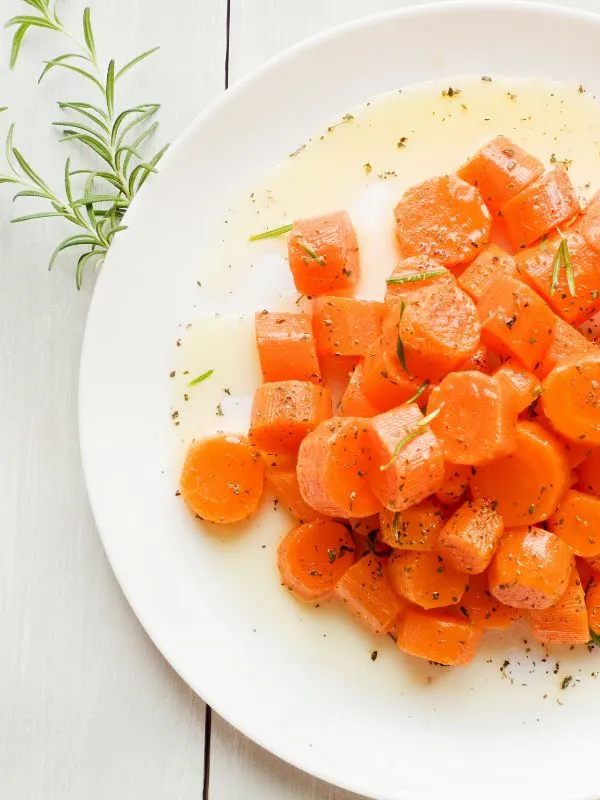 marinated carrots recipe served in a white plate - Easy Marinated Carrots Recipe from Spain
